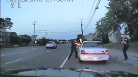 In this image made from July 6, 2016, video captured by a camera in the squad car of St. Anthony Police officer Jeronimo Yanez, the Minnesota police officer shoots at Philando Castile in the vehicle during a traffic stop in Falcon Heights, Minn. (St. Anthony Police department/AP)