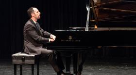 Pianist Spencer Myer is playing a Steinway grand piano