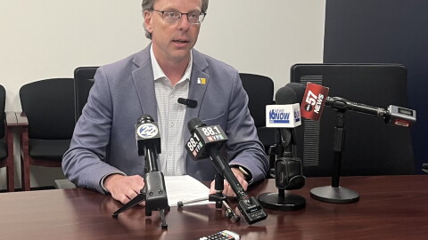 South Bend Mayor James Mueller talks with reporters on Wednesday, Sept. 16, 2026 about his executive order banning city staff from signing non-disclosure agreements about data centers. The move came a week after two South Bend Common Council members learned Mueller's public works director and city engineer had signed NDA's with Amazon.
