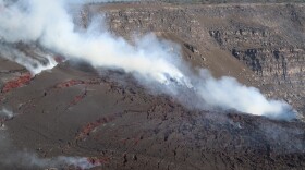 Volcanic gas seeps out of cracks near eruptive vents in Halemaʻumaʻu on July 17, 2025.