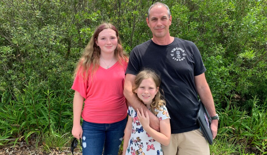 Photo by Gina Gambony/WHRO. Morgan (L), Madilyn, and Jason Nixon. The family is committed to preserving memories of Kate for the baby of the family, Mackenzie (not pictured).
