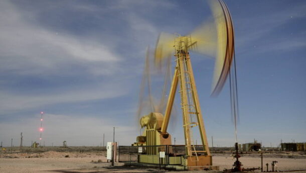 A pumpjack operates north of Carlsbad, NM.