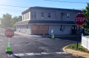 a photo showing additional stop signs and the aftermath of a motor vehicle accident that damaged the Tonya Keller Community Center
