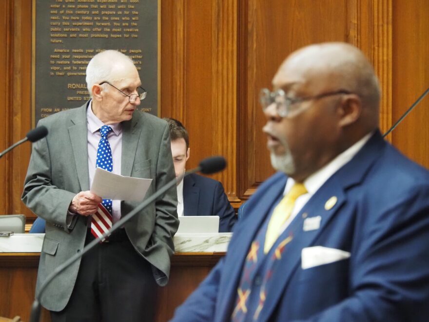 Rep. Jeff Thompson, R-Lizton, listens as Rep. Greg Porter, D-Indianapolis, speaks during a meeting in the Indiana House chambers