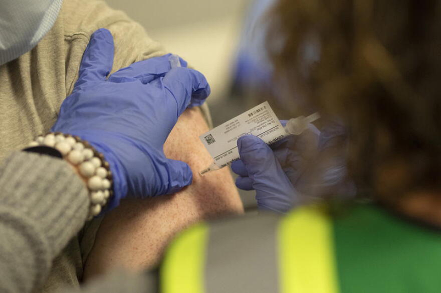 Some schools have been able to coordinate initial COVID-19 vaccines for their teachers, as local health officials work to roll out initial doses to health workers and long-term care residents across the state.