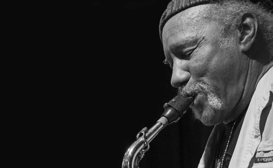 The late jazz musician Charles Neville playing the saxophone.