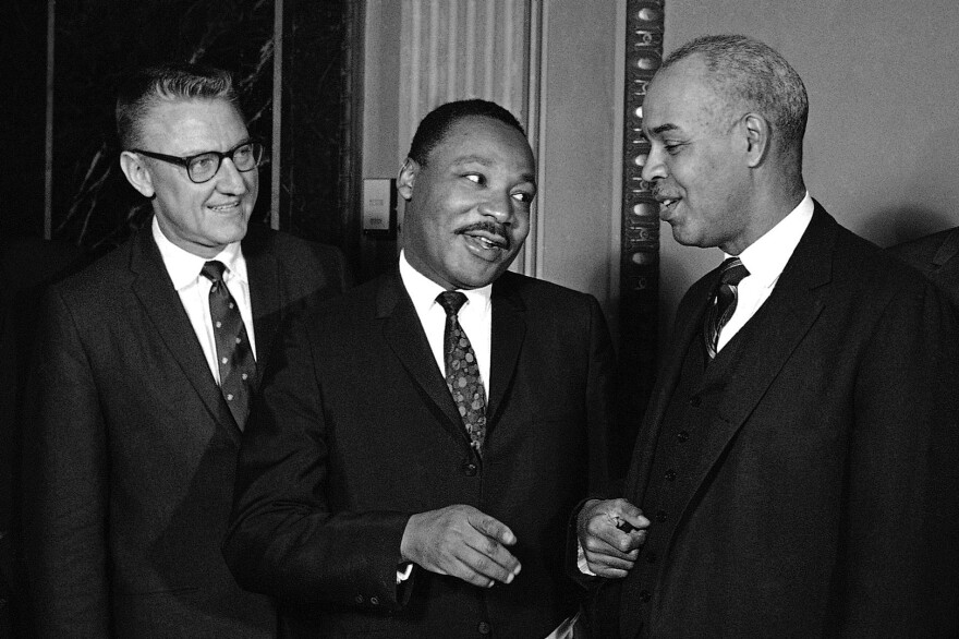 California Rep. James Corman, Martin Luther King, Jr. and NAACP Executive Roy Wilkins in Washington DC as King arrives to testify before the Kerner Commission 10/23/1967. Corman & Wilkens are two members of this 11 member commission.