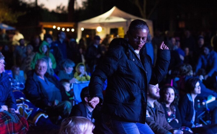 Cassandra Lister, 49, grooves during the Savants of Soul performance at the frank2015 Community Fair. The free and public concert celebrated the Bo Diddley Plaza reopening on Thursday. (Cresonia Hsieh/WUFT News)