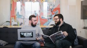 Ryan Pitkin (left), Queen City Nerve's editor-in-chief, sits alongside the paper's publisher, Justin LaFrancois.
