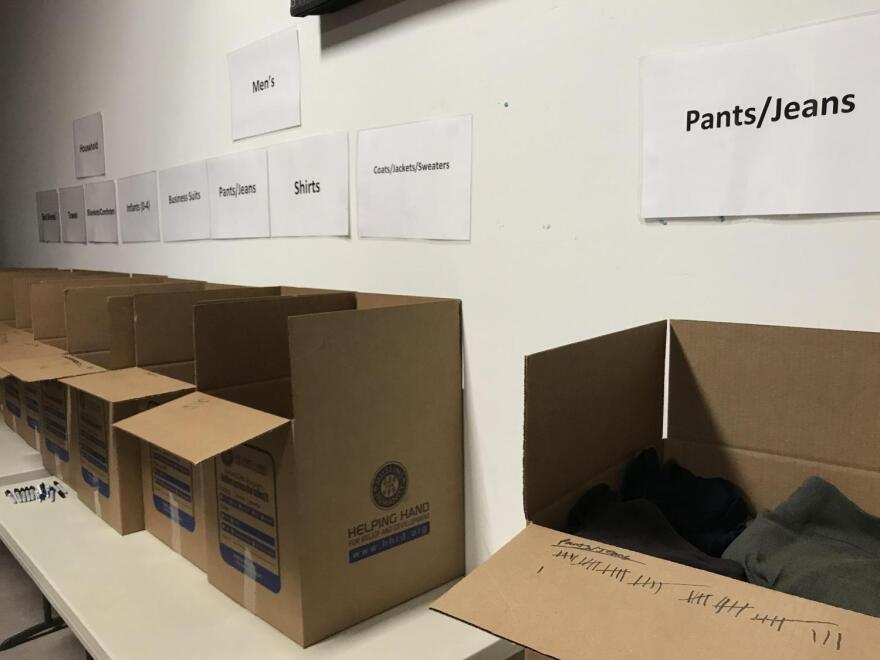 Volunteers packed large containers with resources needed to support refugees living in camps around the world on Saturday.