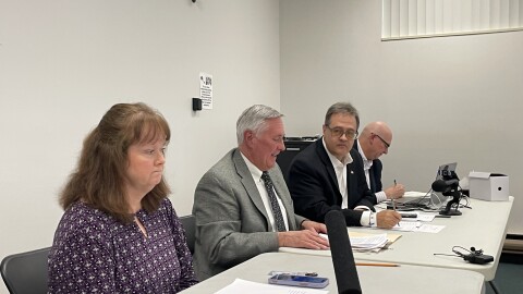 Medina County Budget Commission members discuss the results of an executive session where they reviewed a lawsuit from a local school district attempting to halt an attempt to rollback school taxes.