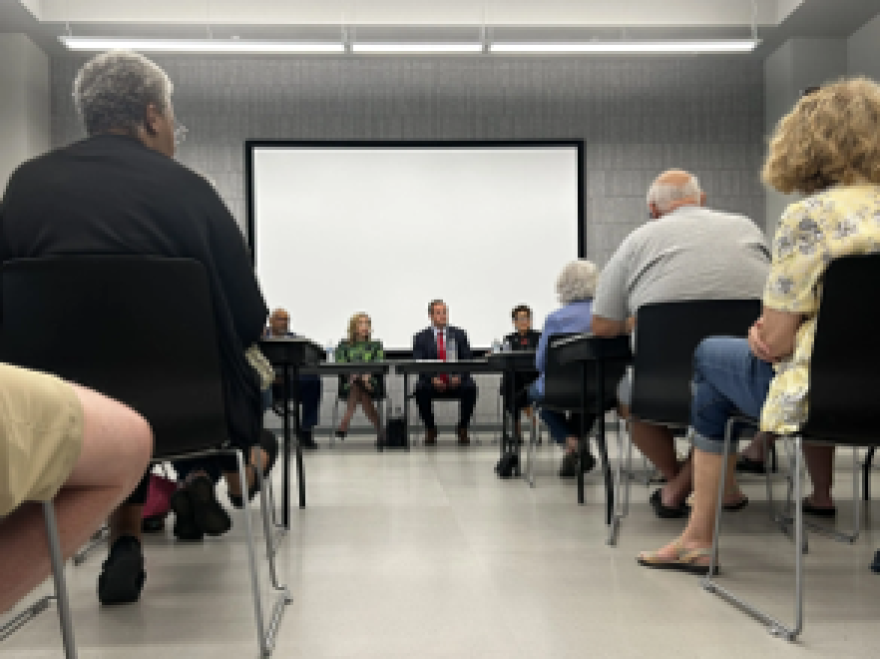 From left, Fairo Mitchell, director of the public utilities for the Oklahoma Corporation Commission, Joy McGill, state director of advocacy for AARP, State Rep. Brad Boles, R-Marlow, and Rep. Meloyde Blancett, D-Tulsa, at a town hall about electricity rates held Thursday, Aug. 13, 2026, at the Bronson Brookside Library in Tulsa.