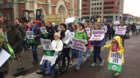 Hundreds march up Capitol Ave. in Indianapolis for a pro-life event.