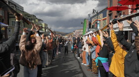 Participants raise their glasses (and skis) after breaking the record for longest shot ski at the 10th Annual Park City Sunrise Rotary Shot Ski event Oct. 12, 2026.