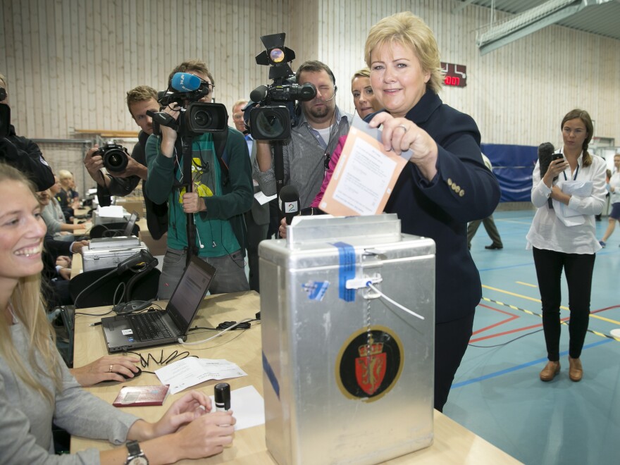 During the 2013 elections, online voting was an option in Norway. Even so, Erna Solberg, chairman of the Conservative Party of Norway, casts an old-school ballot.