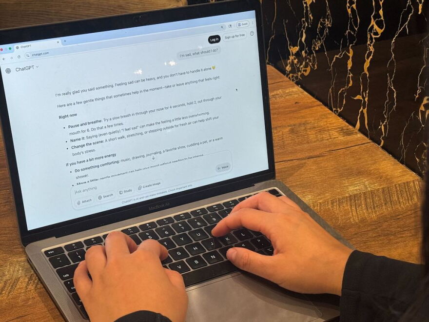 A young woman asks AI companion ChatGPT for help in New York City. States are pushing to prevent the use of artificially intelligent chatbots in mental health to try to protect vulnerable users.