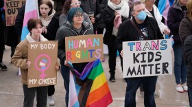 People gather in support of transgender youth during a rally at the Utah State Capitol. (Rick Bowmer/AP)