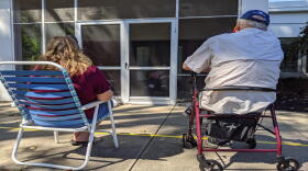 Ann Pautler (from left) and her father Albert Pautler visit their mother and wife, Marilyn Pautler, at the Elderwood at Lancaster nursing home in August. 