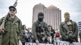 Demonstrators display open carry firearms at a Second Amendment Protest in response to Gov. Michelle Lujan Grisham's recent public health order suspending the conceal and open carry of guns in and around Albuquerque for 30-days, Tuesday, Sept. 12, 2023, in Albuquerque, N.M. (AP Photo/Roberto E. Rosales)