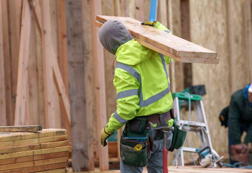 Construction at a group of homes on Southeast Harold Street near Southeast 122nd Avenue, in Portland, April 12, 2023. Justin Wood’s company is developing the site, and focuses on building new homes for people living at or below median income levels. 