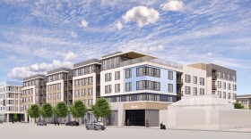 A mockup of a five-story apartment complex.