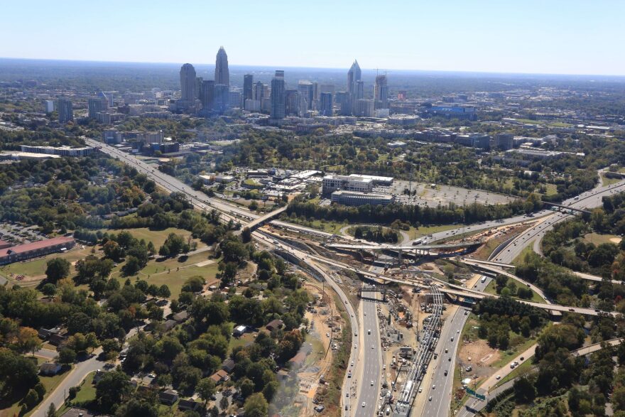 An aerial view of the I-77 Express Lanes construction near uptown Charlotte in October shows a new westbound ramp under construction from I-277 westbound to I-77 southbound. 