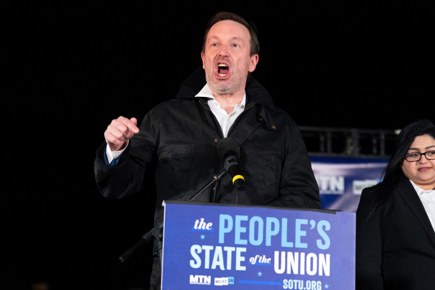 Sen. Chris Murphy, D-Conn., speaks during the "People's State of the Union" rally outside of the U.S. Capitol Tuesday, Feb. 24, 2026, in Washington. (AP Photo/Jose Luis Magana)