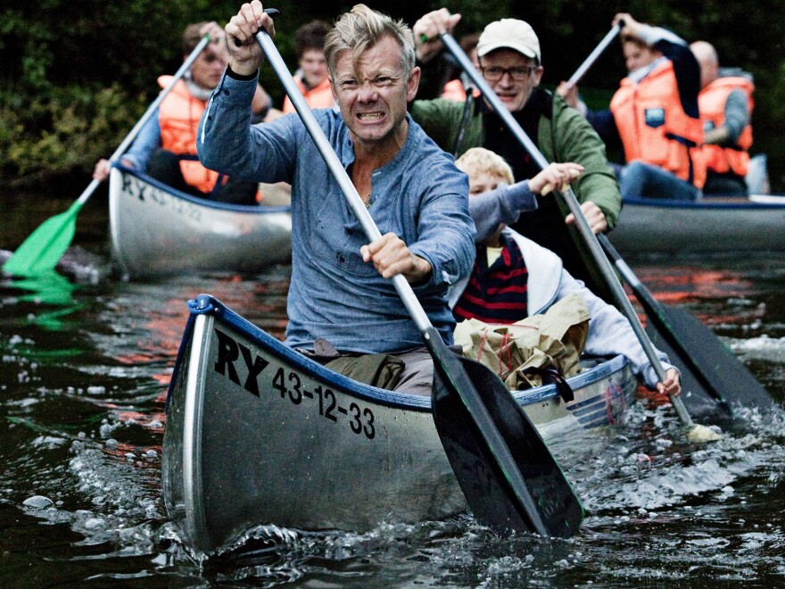 Casper (Casper Christensen, front) is Frank's impossibly horny friend, whose decidedly racy plans for the canoe trip are derailed by Bo's presence.