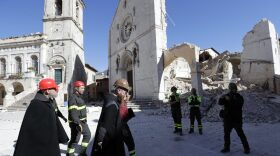 Monks walk in front of the Cathedral of St. Benedict in Norcia, central Italy, Italy, Monday, Oct. 31, 2016. (Gregorio Borgia/AP)
