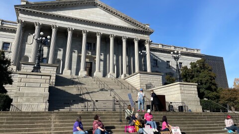 Protesters gather on the grounds of the South Carolina State House in Columbia on Nov. 18, 2025, as lawmakers meet to discuss a bill that critics say could create one of the nation’s strictest abortion bans. The proposal seems unlikely to garner sufficient support among Republicans, who control the General Assembly, but if it was signed into law, women who obtain an abortion could be subject to a prison sentence of up to 30 years. (Sabriya Rice/KFF Health News)
