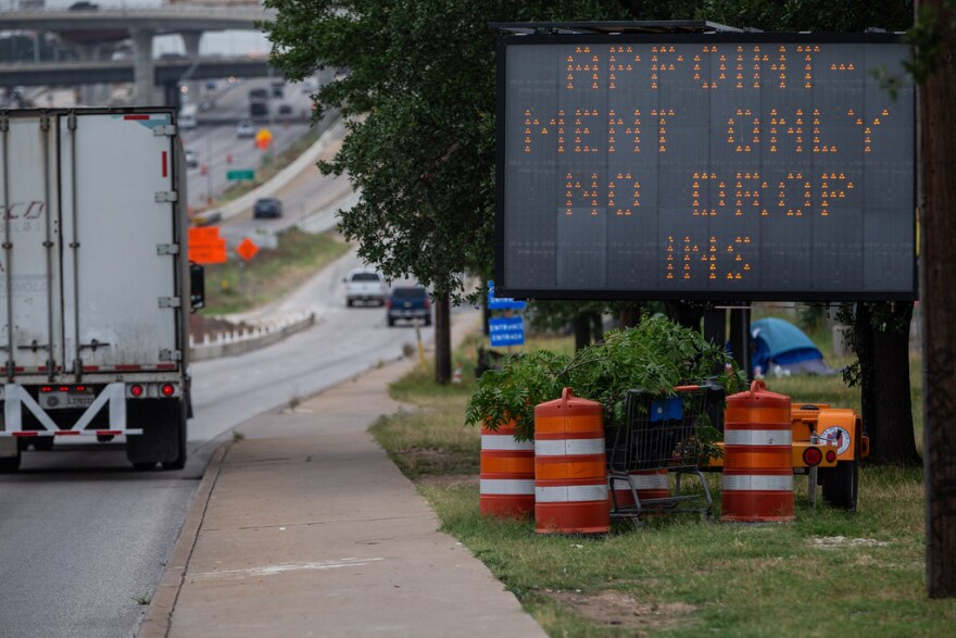 A sign at the entrance to Austin Public Health's drive-thru coronavirus testing site.