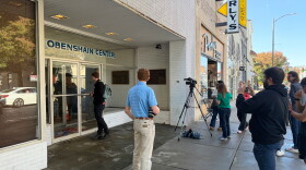 Reporters gather outside the Obenshain Center on Thursday, Oct. 29, 2026, in Richmond, Va.
