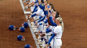 Florida's softball team stand in line and chomp their arms in celebration of their win against Auburn at Katie Seashole Pressly Stadium in Gainesville, Fla., Friday, April 17, 2026. (Libby Clifton/WRUF)
