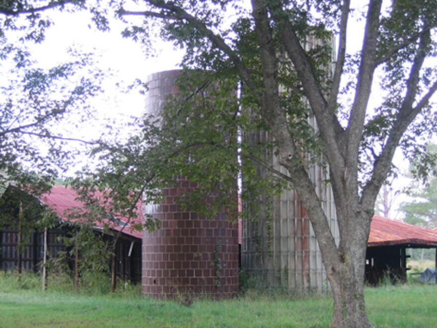 An old barn and silo sit on part of what would be the newest park in Lumberton.