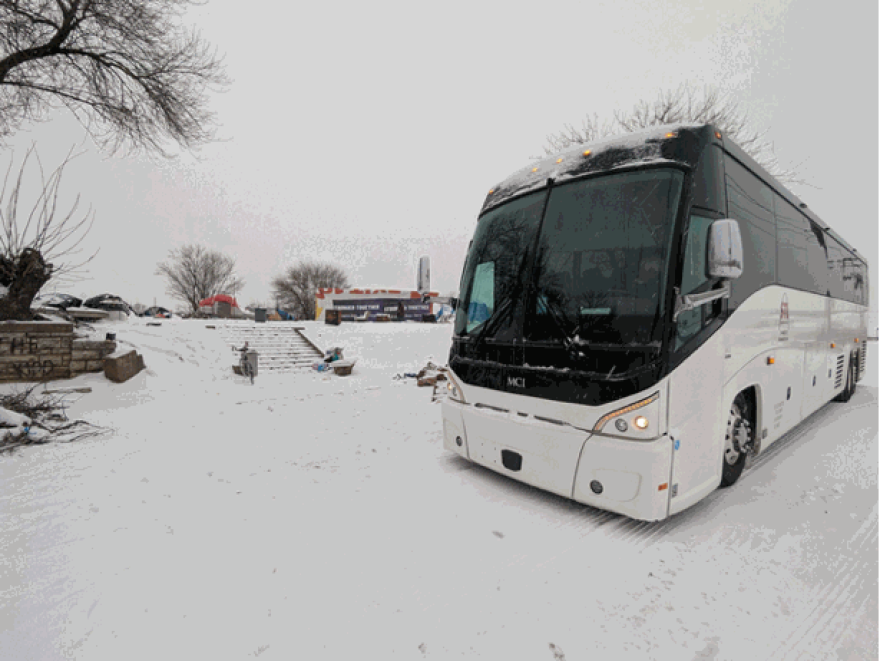 A mobile warming bus rests at 10th street and Cass Avenue in north St. Louis on Saturday, Jan. 24, 2026. The buses were recently revamped after a two-year hiatus in efforts to support unhoused individuals and provide warmth and transportation to shelters during cold temperatures.