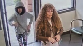 Melodee Buzzard (left) and her mother Ashlee Buzzard picking up a rental car October 7.