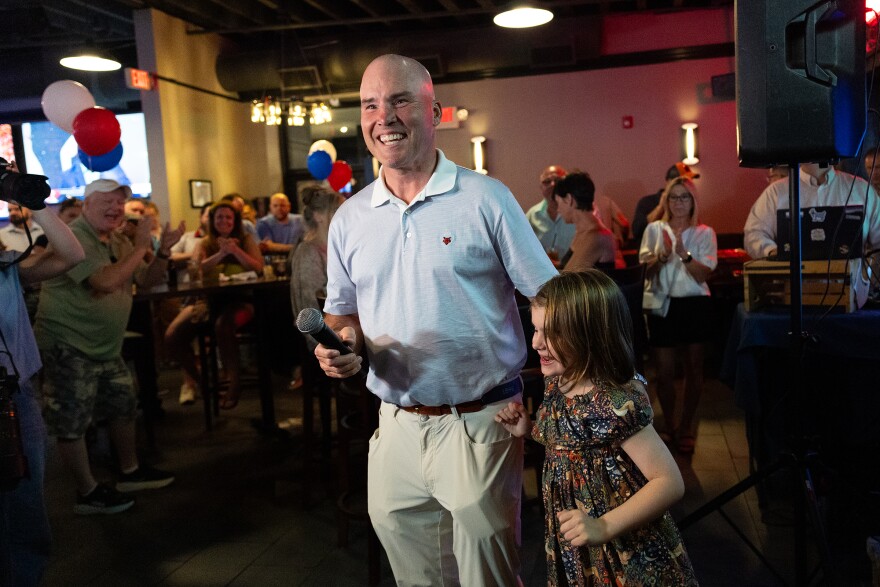 Senator Marty Flynn walks with his daughter, Aria, after speaking to supporters during an Election Night party at Benny's of Downtown in Scranton on Tuesday, May 19, 2026.