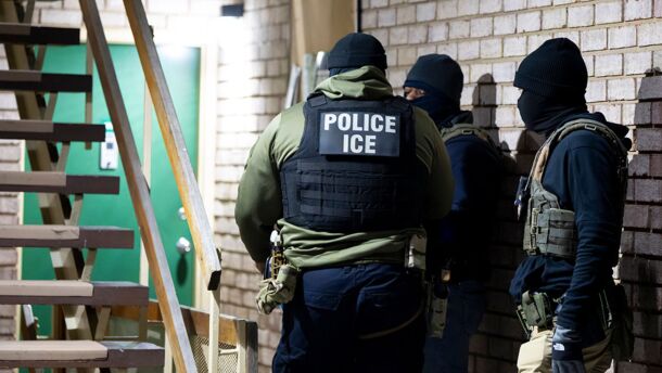 U.S. Immigration and Customs Enforcement officers wait to detain a person, Jan. 27, 2025, in Silver Spring, Md. (AP Photo/Alex Brandon)