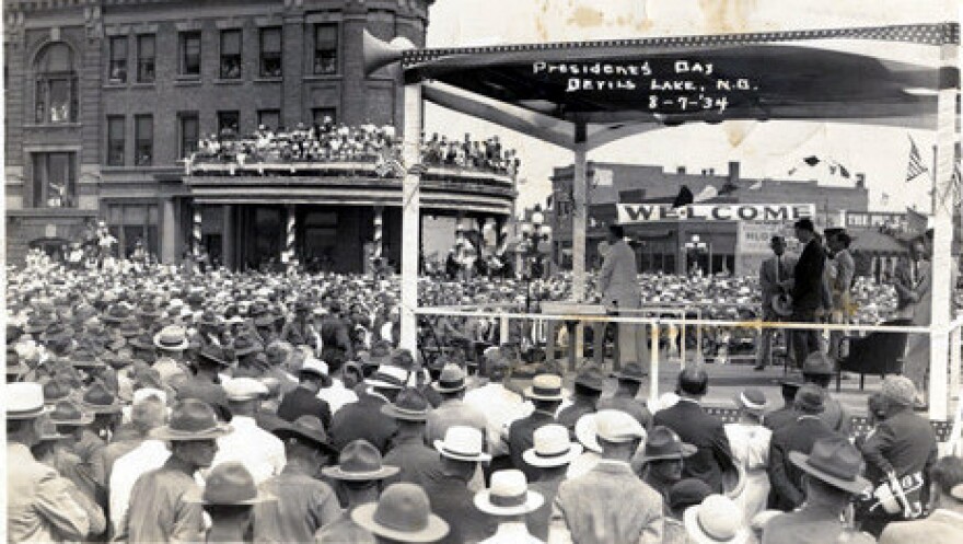 FDR addresses the crowd in Devils Lake. Wilt recalled the weather being warm and pleasant while they waited outside the Great Northern Hotel for the train to arrive. His father boosted Wilt, his brother and sister up to a window sill of the Hotel so they could see the President.