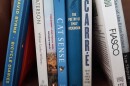 An image of several books on a shelf