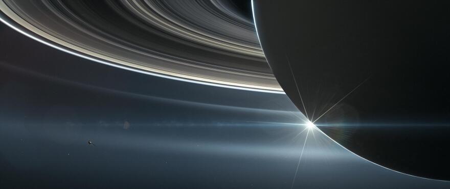 This illustration shows NASA's Cassini spacecraft in orbit around Saturn. Cassini made 22 orbits that swooped between the rings and the planet before ending its mission on Sept. 15, 2017, with a final plunge into Saturn.