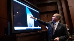 U.S. Deputy Director of Naval Intelligence Scott Bray explains a video of an unidentified aerial phenomena, as he testifies before a House Intelligence Committee subcommittee hearing at the U.S. Capitol on May 17, 2022.