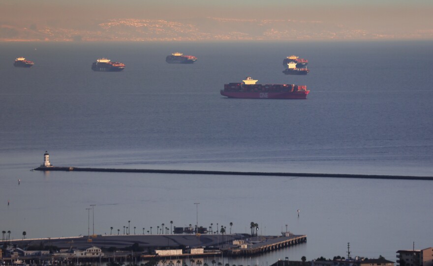Container ships and tankers are anchored close to the ports of Los Angeles and Long Beach on Feb. 1 in San Pedro, Calif. The Port of Los Angeles logged its busiest month in history in May.