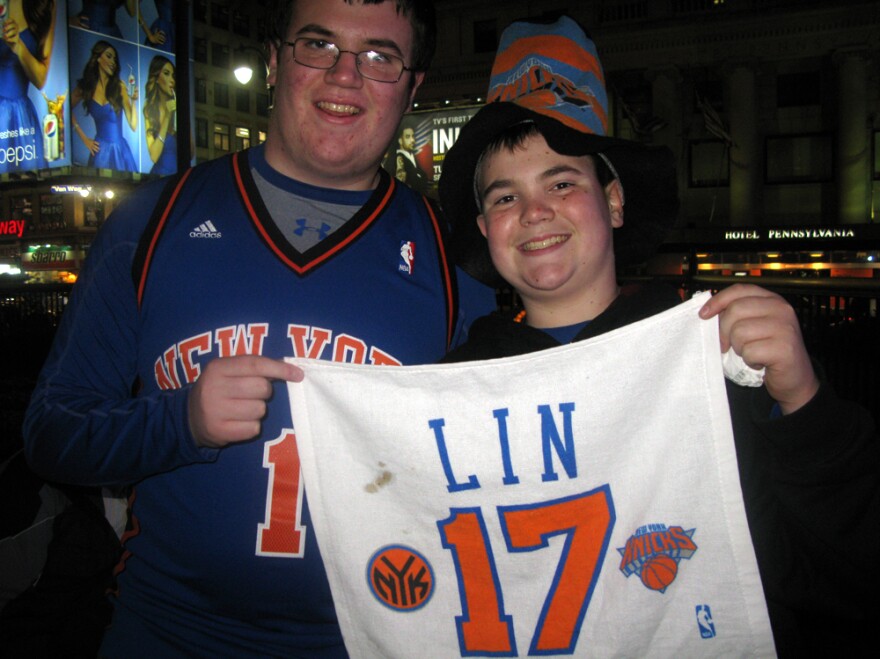Jeremy and Zach Allen, fans of basketball player Jeremy Lin, attend the Knicks game Wednesday. The 16- and 12-year-old are from Oceanside, Long Island.