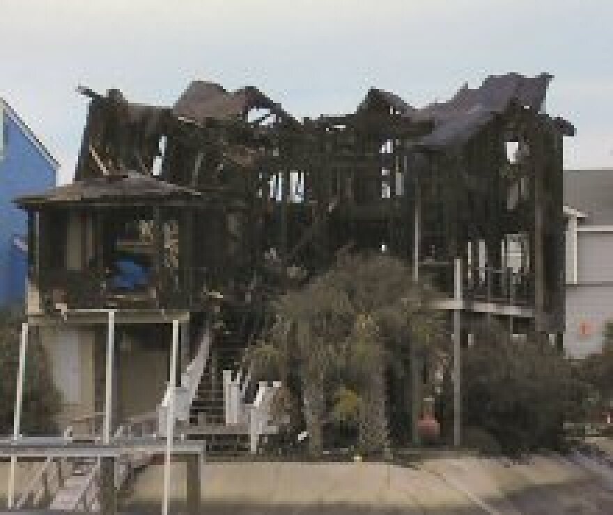 A view of the back of the house, where the worst damage appears to have occured.
