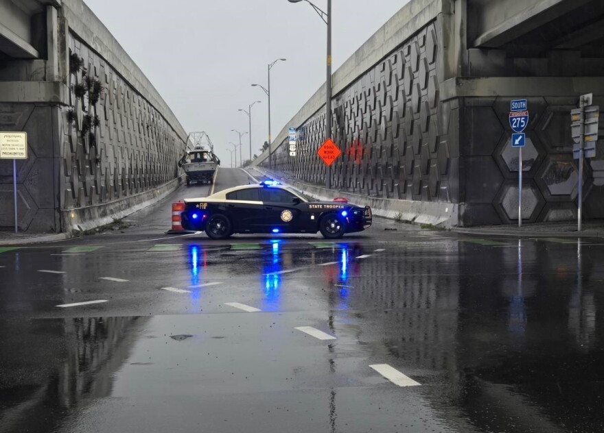 A Florida Highway Patrol vehicle blocks access to the Sunshine Skyway after the bridge was closed Wednesday, Oct. 9, 2024.