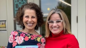 Lesléa Newman (left), author of “Alicia and the Hurricane: A Story of Puerto Rico/Alicia y el huracán: Un cuento de Puerto Rico” and Carmen Yulín Cruz Soto, former mayor of San Juan, giving a bilingual reading at Odyssey Bookshop in South Hadley, Massachusetts, on June 11, 2022.
