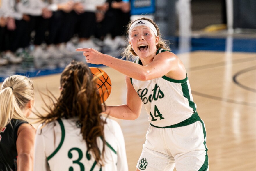 Action shot of basketball forward Emree Zars against MSUM