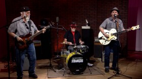 Rockabilly Strangers (left to right): singer-bassist Tim McKeller, drummer Red Whiting, and singer-songwriter-guitarist C.L. Smith