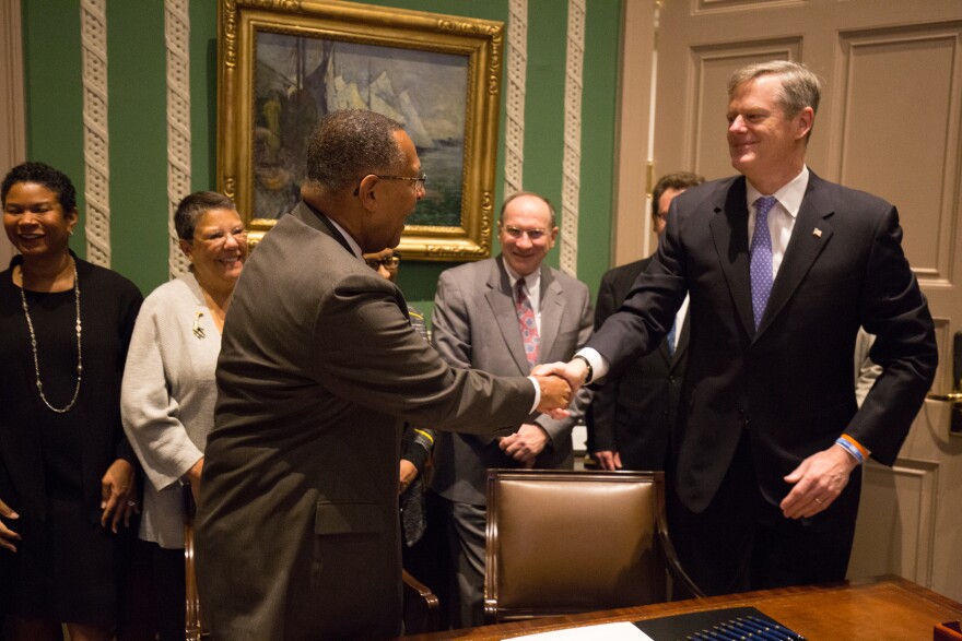 In a file photo from January 2017, Governor Charlie Baker was joined by Chief Justice Roderick Ireland, and others in the signing of an act designating the Hampden County Superior Court as the Roderick L. Ireland Courthouse.